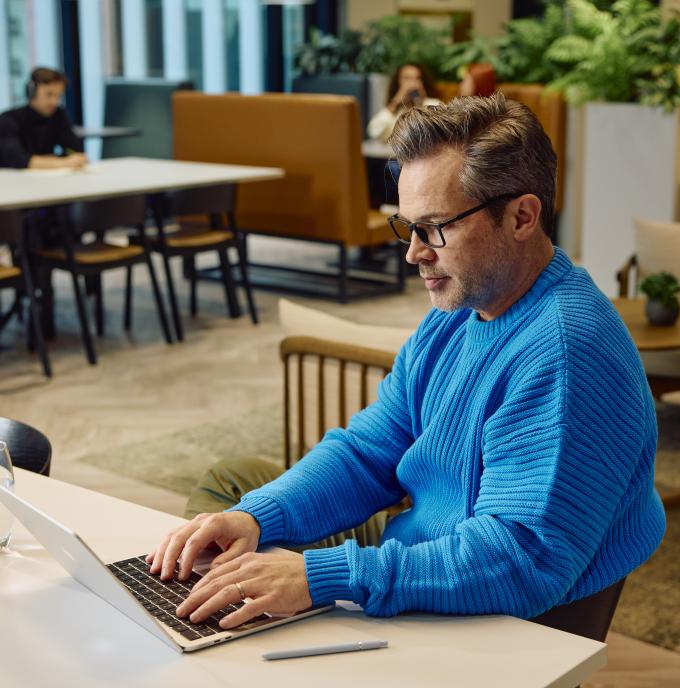 Man working from laptop in coworking