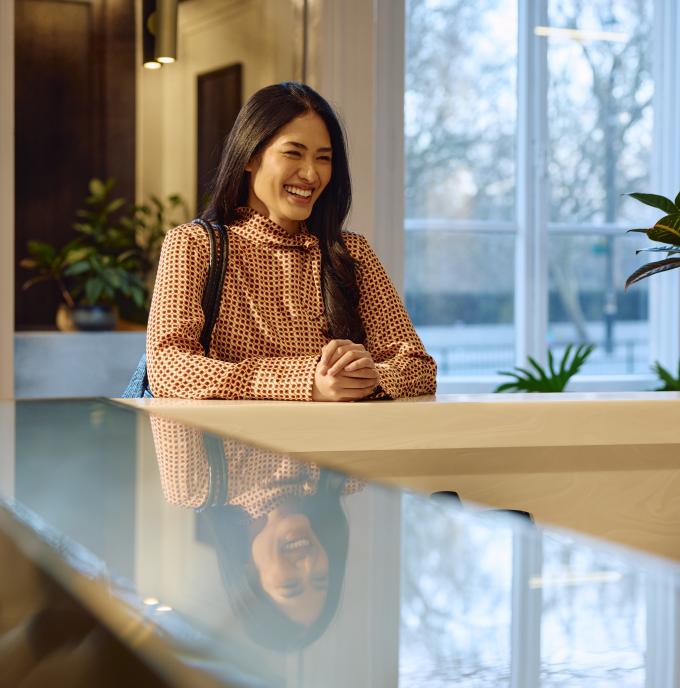 Woman at reception desk